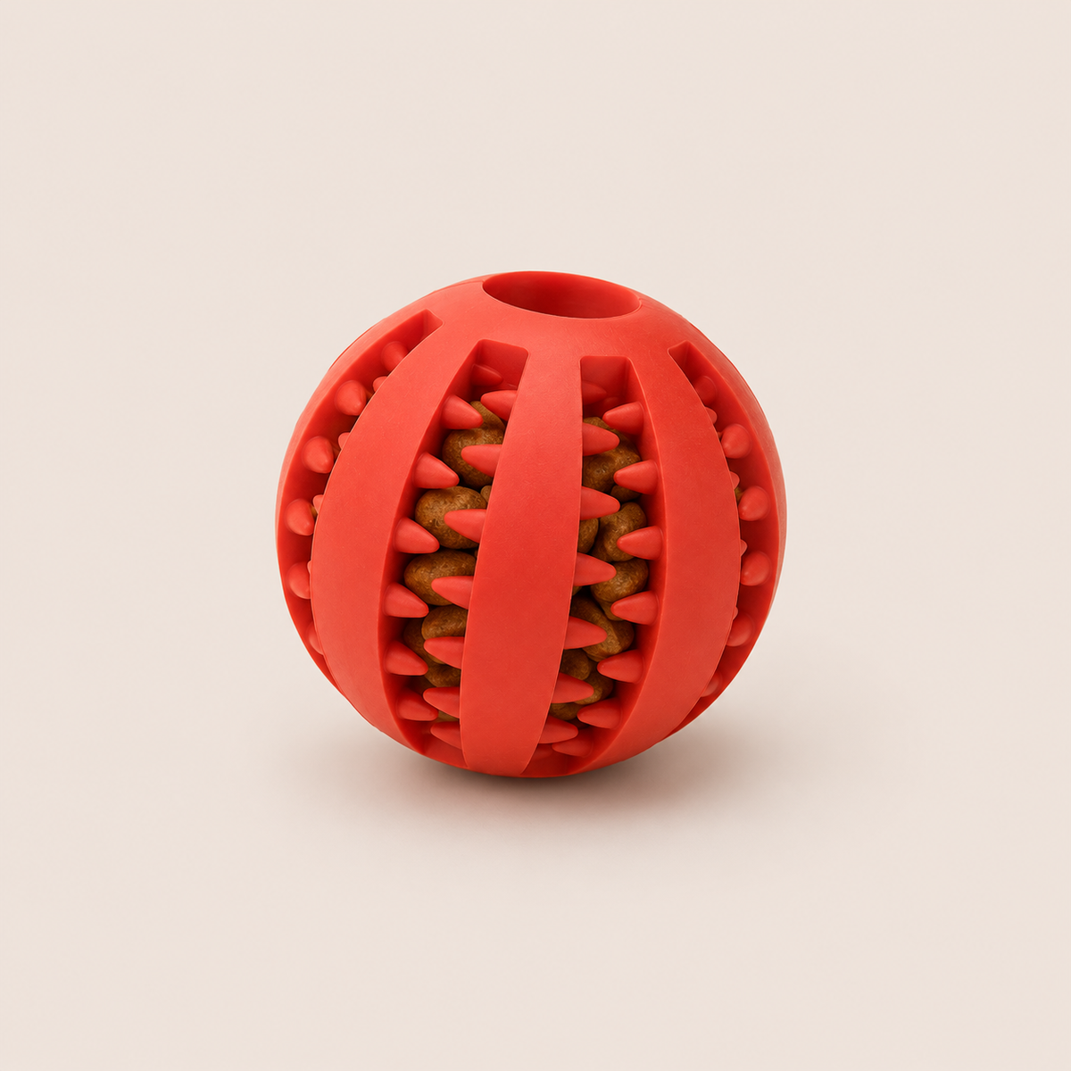 Balle mordante distributrice de friandises